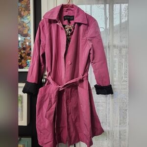 Women's Pink Trench Coat, good condition, Is Used, size medium,  rain coat.